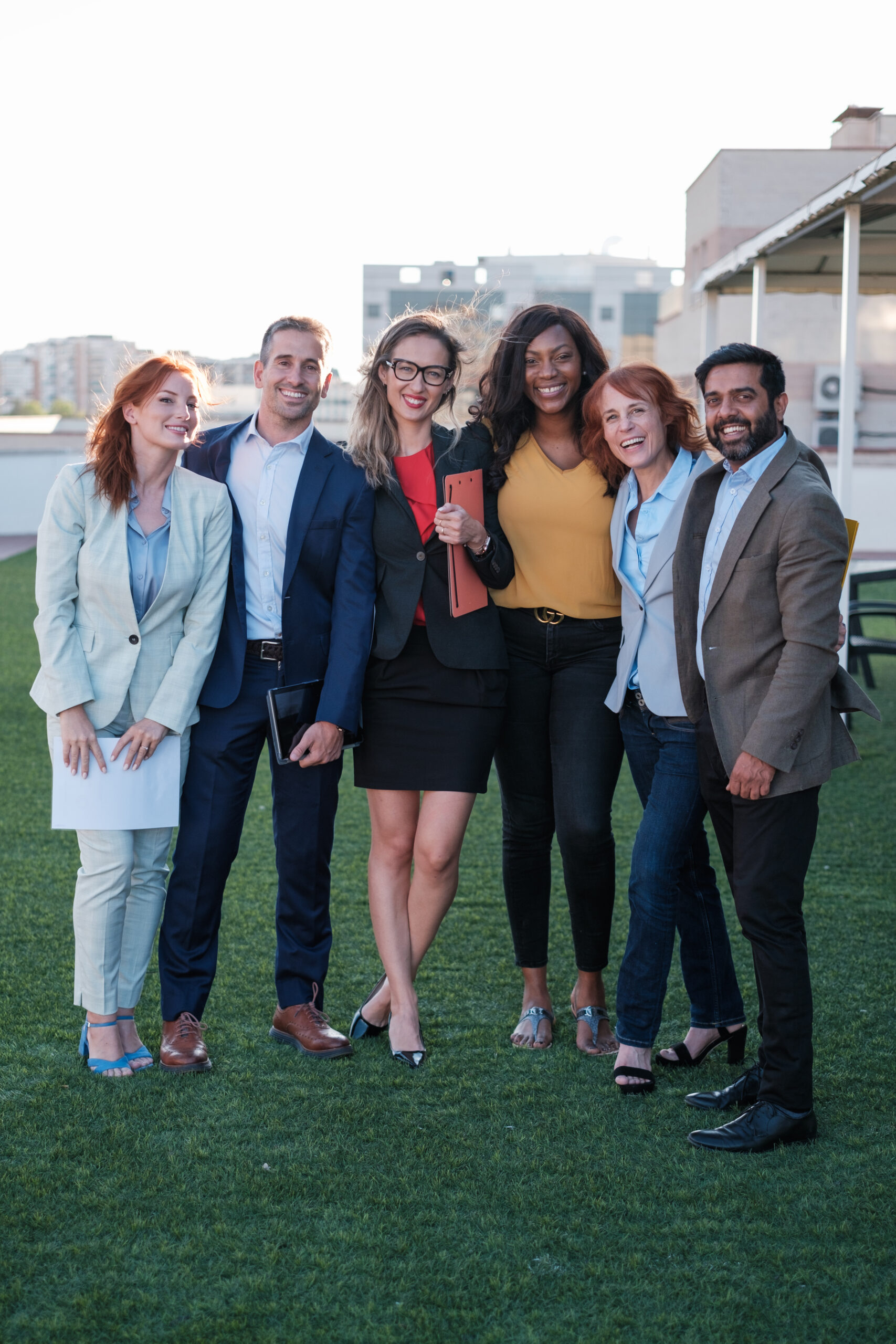 Group of workers together taking a corporate team photo. Concept: Business, colleagues, friendship Group of workers together taking a corporate team photo. Concept: Business, colleagues, friendship